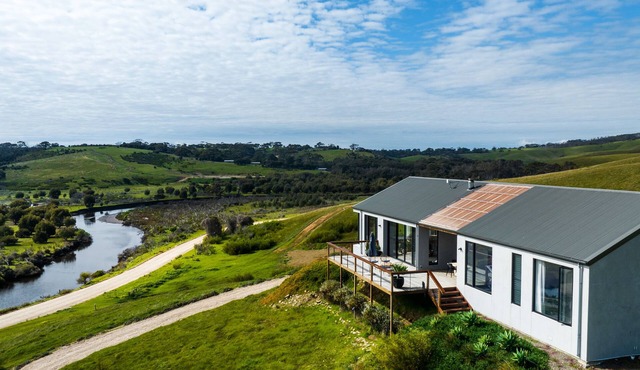 Luxe off-grid beach house with panoramic views of Middle River & Snelling Beach