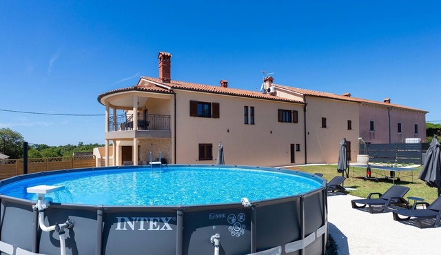 "Luxuriöse App. mit Pool" by Interhome