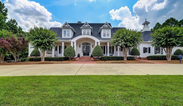 Luxurious 13,000 sq. ft. home: 7 private king suites, bunk room & movie theater