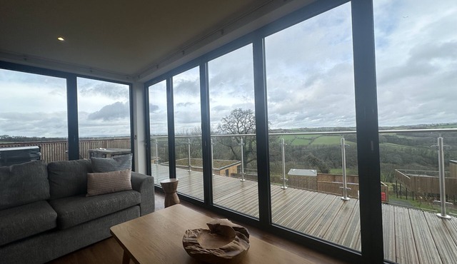 Luxurious 3 bedroom lodges with views over the lush green valley