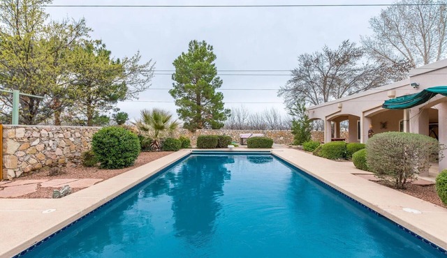 Luxurious 4-bedroom farmhouse with pool and upscale amenities located in Mesilla