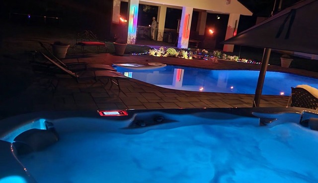 Luxurious 5-bedroom house in serene Eagle with sauna, pool, and fitness room.