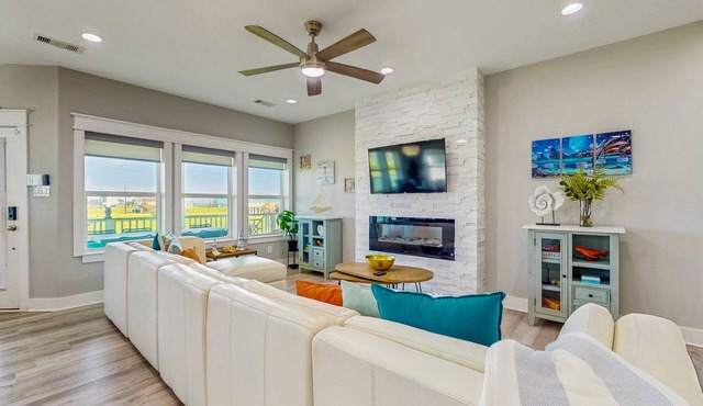 Luxurious beach house with outdoor dining and elegant design - steps to beach