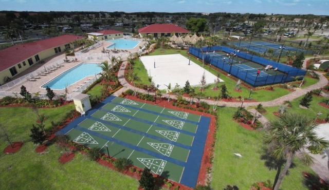 Luxurious Class A RV Resort Lot in South Florida w/Tiki Hut, Kitchen & Bungalow.