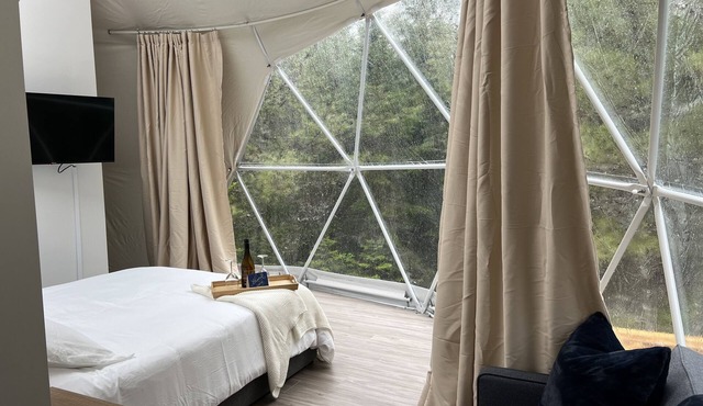 "Luxurious Escapes Await: Private Hot Tubs and Kayaks at Norse Geodesic Retreat"