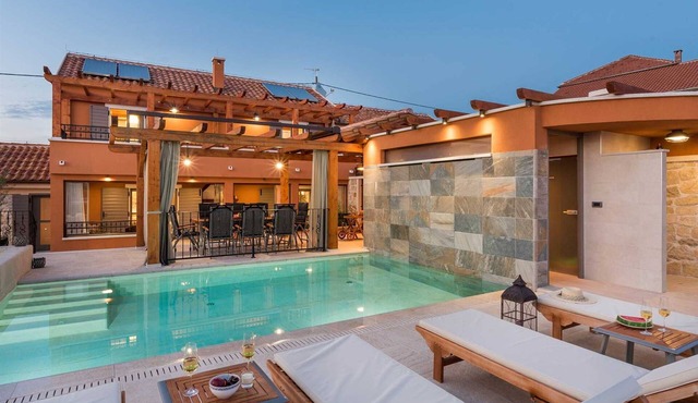 Luxurious five star heated pool villa for 10-12 people