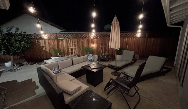 Luxurious King Bed with Outdoor Space and 85” TV