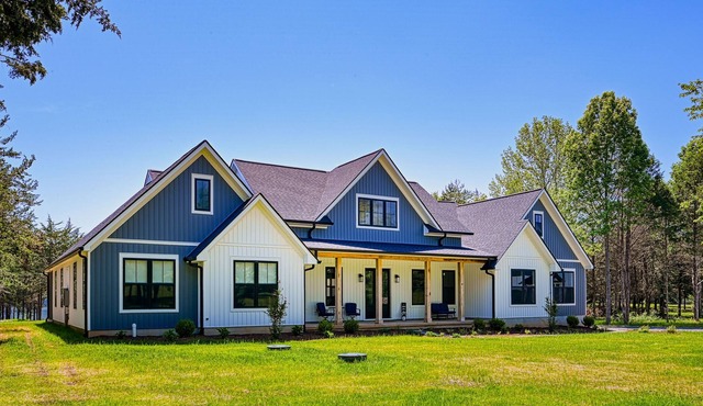 Luxurious lakeside home with private dock, beach, patio, & game room - dogs OK