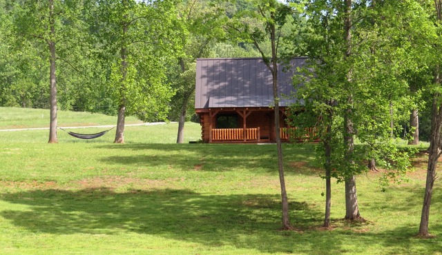 Luxurious Log Cabin On 200 Acres Overlooking Private Lake.