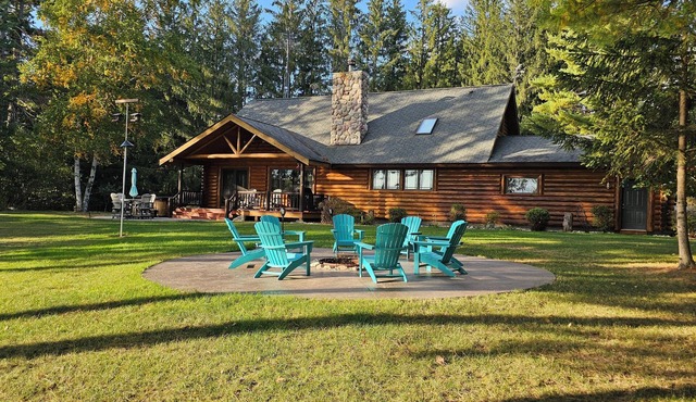Luxurious Northwoods Log Lake house with over 500ft of lake frontage on 15 acres