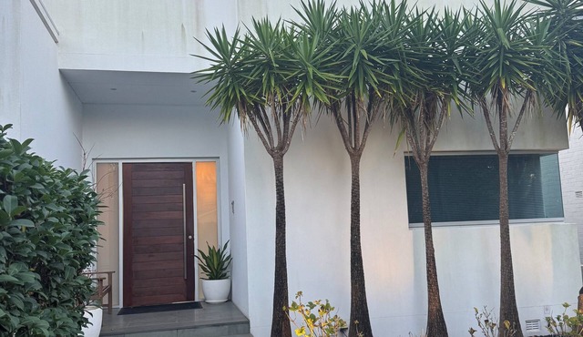 Luxurious Parkside residence, architecturally designed tri-level home with pool.