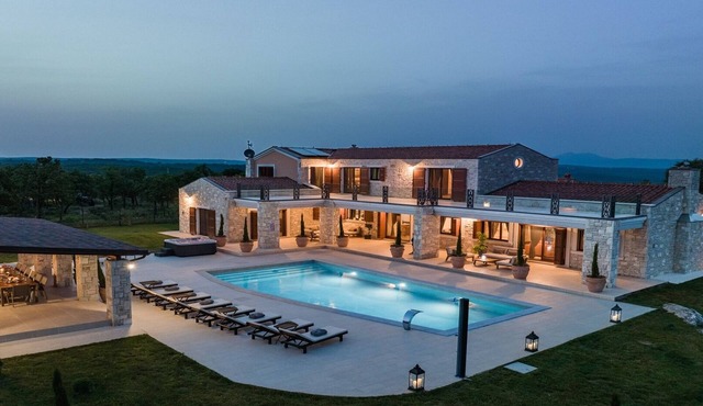 Luxurious poolside villa on spacious estate