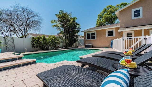 "Luxurious Retreat with Pool, Game Room, and Outdoor Oasis!"Close to TPA, RayJay