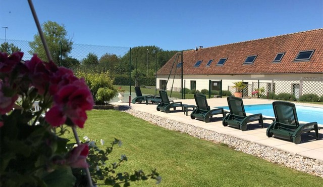 luxurious villa in the north of France with swimming pool and tennis court