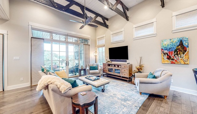 Luxurious villa with outdoor TV lounge, kitchen & alfresco dining space