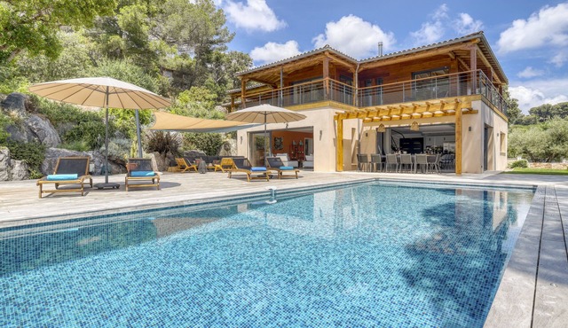 Luxurious waterfront villa with heated pool