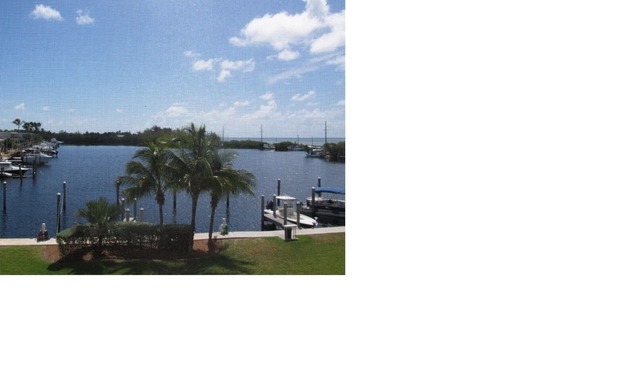 Luxury 3 bedroom condo overlooking harbor with ocean view, boat slip, amenities