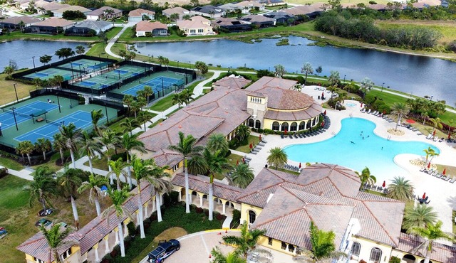 Luxury 3BR Coach Home in Gated Gran Paradiso -Resort Amenities, Pool & Views!