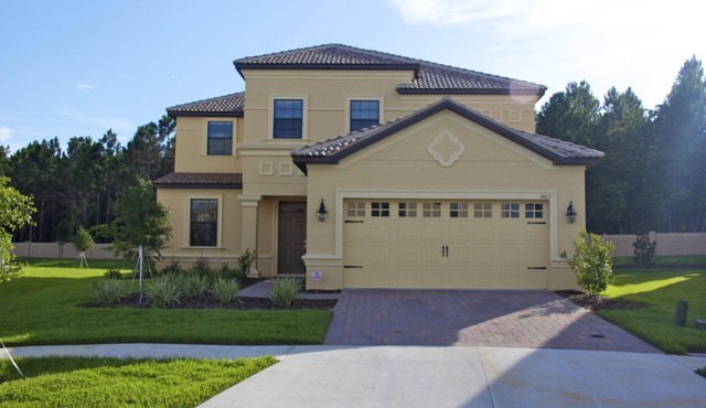 Luxury 5 bed; outside BBQ/TV area with South facing pool