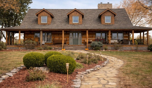 Luxury 5-Bedroom Log Home on 40 Acres in Gated Farm Community