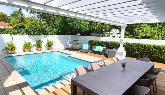 Luxury 5BR/4BA Villa Pool Steps to Design District Shopping & Dinning!