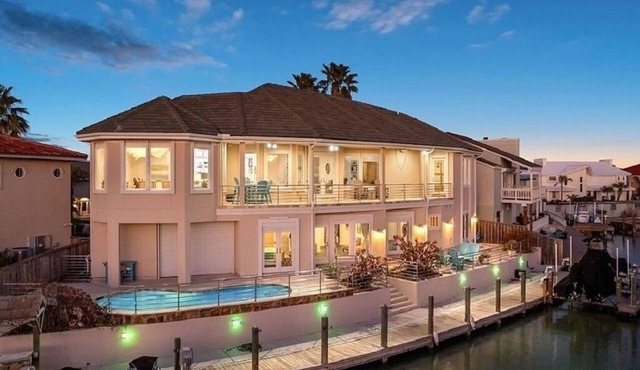 Luxury 6-bedroom waterfront with pool, boat & jet ski lift on serene Island