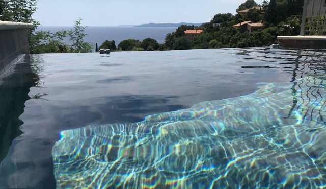 Luxury 6-bedroom villa with heated pool, 180° sea view, walking distance to beach