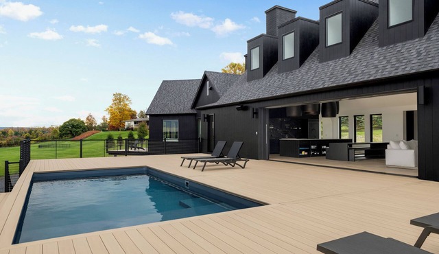 Luxury 7 Bed Black House Retreat in Skaneateles — Spacious & Stylish Getaway