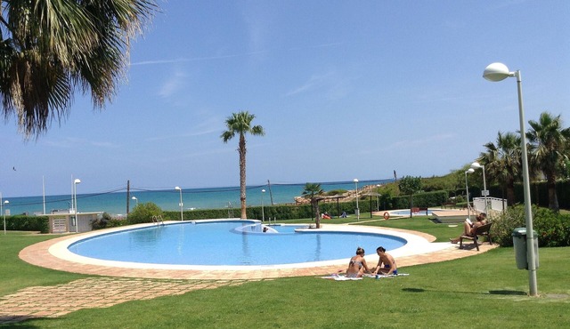 Luxury air conditioned beach front apartment with large patio.