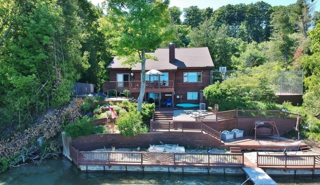 Luxury Bayfront Retreat on Grand Traverse Bay with Private Beach and Sport Court