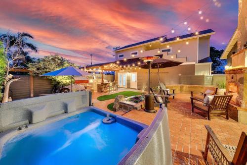 Luxury beach home one block from ocean with spa, WiFi, & gorgeous outdoor space