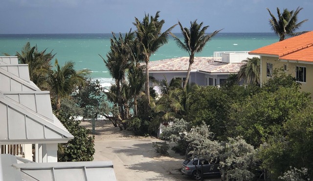 Luxury Beach Villa with Private Rooftop Pool & Elevator, Steps to Tranquil Beach