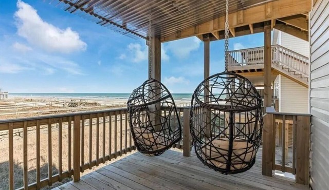 Luxury Beachfront Condo with Covered Deck Steps From Beach & Golf Cart Rental