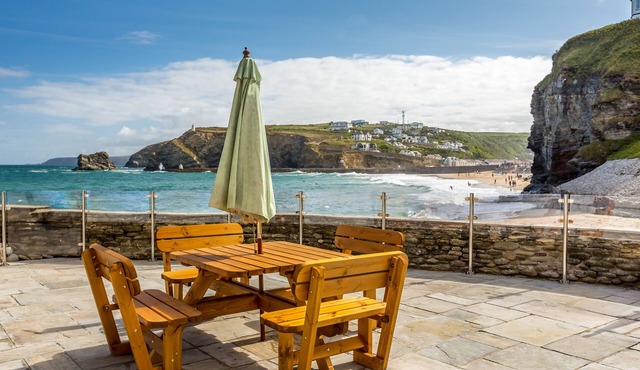 Luxury Beachfront cottage only 20 steps from the sand with private parking/patio