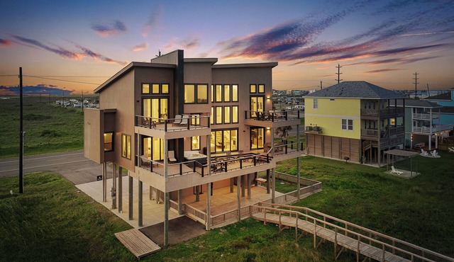 Luxury beachfront home, pet friendly, hot tub, elevator, private boardwalk