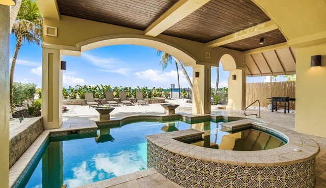 Luxury Beachfront Vacation Getaway on Bonita Beach | Sleeps 12