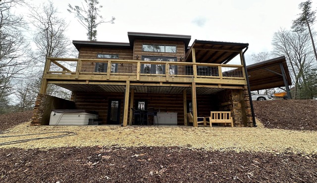 Luxury cabin in county but not far from downtown. Hot tub on back porch.