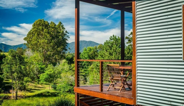 Luxury cabins on 7.5 acres of beautiful gardens, forest and waterways.