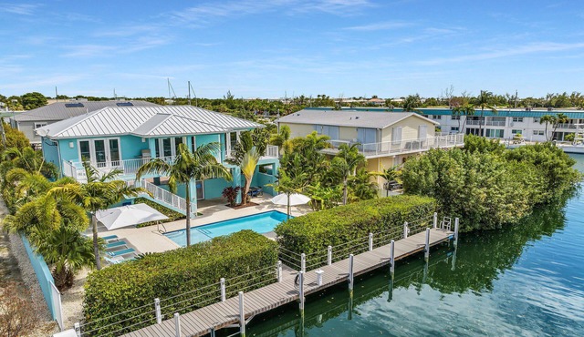 Luxury Canal Home | 70’ Dock, Heated Pool, Viking Kitchen & Ocean Access