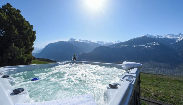 Luxury chalet with sauna and jacuzzi. 180 degrees view over the Rhone valley