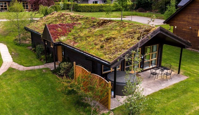 Luxury chalet with hot tub and loch views