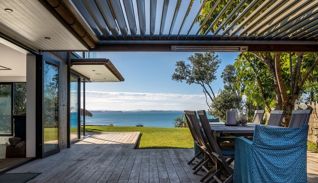 Luxury clifftop retreat with 180° views and private access to beach