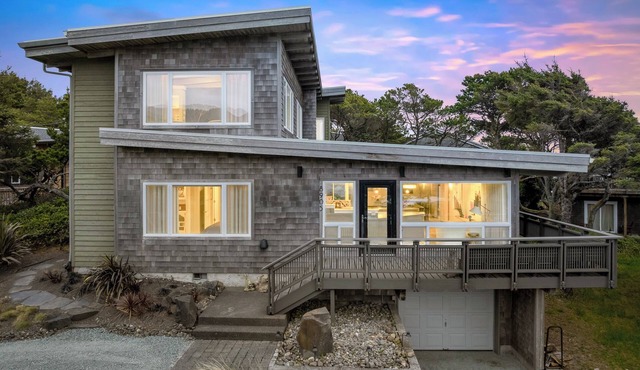 Luxury coastal home with ocean views, deck, and artful interiors. Mid-term rental, 30+ nights.
