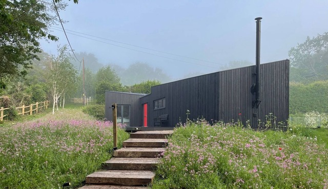 LUXURY CONTEMPORARY ECO CABIN WITH TENNIS COURT AND INDOOR POOL