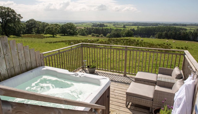 Luxury cottage with panoramic views towards the Lake District and private hot tub