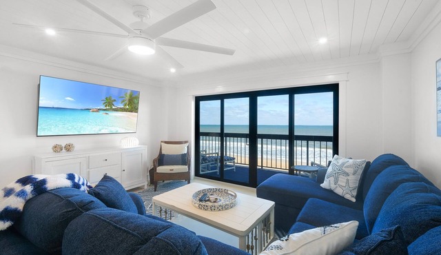Luxury direct oceanfront 3/3 corner with large private balcony, heated pool and garage