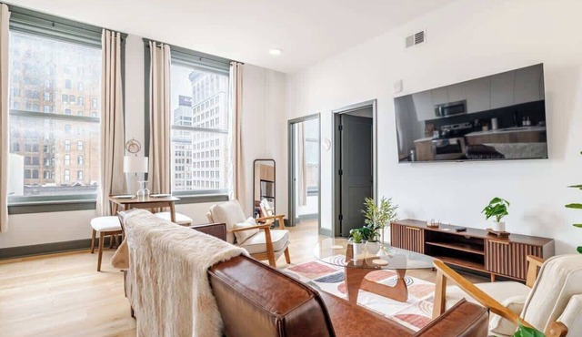 Luxury. Downtown. City Views. Walk Anywhere. Rooftop Access.
