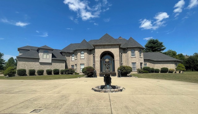 Luxury Estate nestled atop stunning mountaintop golf course!
