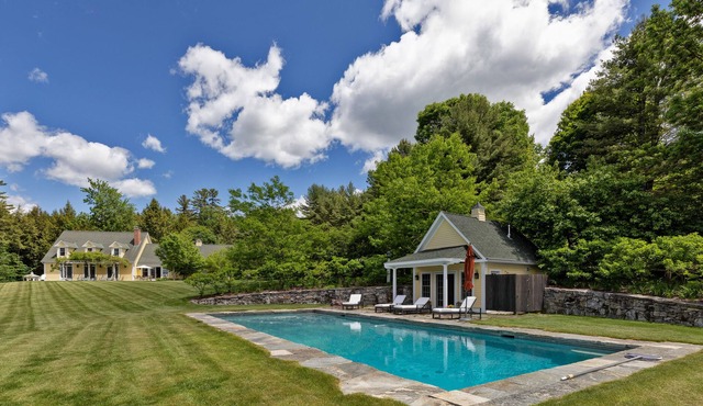 Luxury estate on 17 acres with private pool, pond, gym, game room & views