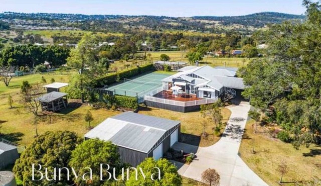 Luxury Estate set over 2 acres w/Tennis Court
